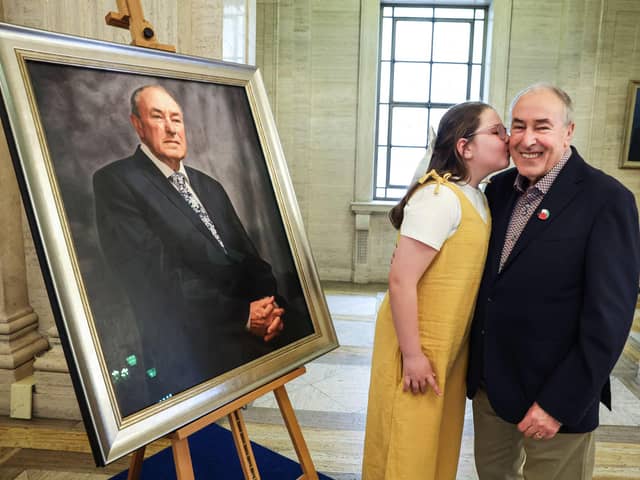 Pictured at the unveiling ceremony is former Speaker of the Northern Ireland Assembly Mitchel McLaughlin and his granddaughter Saorlaith.