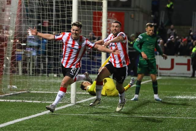 Danny Mullen races away to celebrate his injury time winner against St Pat's on Friday night. Photo by Kevin Moore.