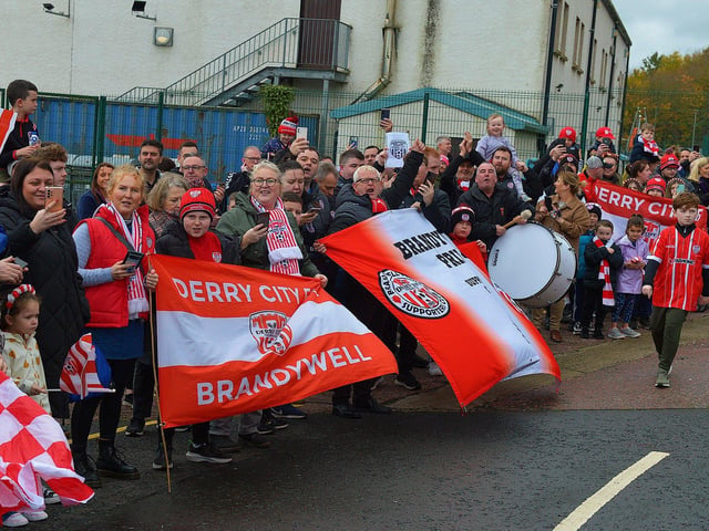 Fans gather at Brandywell Stadium on Saturday morning to give wish Derry City players and coaches good luck as they depart for Dublin ahead of tomorrow’s FAI Cup Final against Shelbourne. George Sweeney. DER2244GS – 45