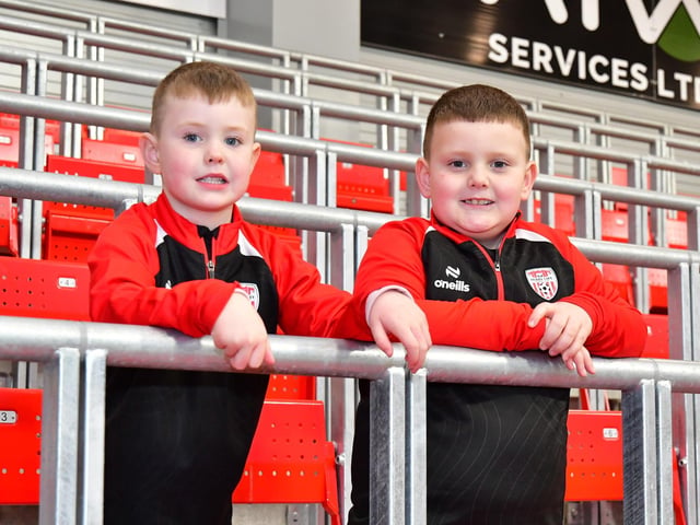Two young City fans pictured in the North Stand on Friday night.