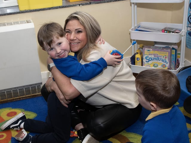 A big hug from Granny during the Holy Child PS Grandparents To School Day. (Photos: Jim McCafferty Photography)
