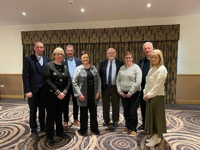 Rev Livingston, Rev Blair and Fr Canny with Carers and Geraldine McLaughlin.