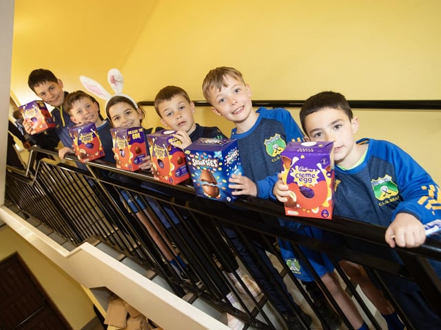 EGG TIME!. . . . .Some of the footballers and hurlers enjoying the Easter eggs at Beart on Saturday.