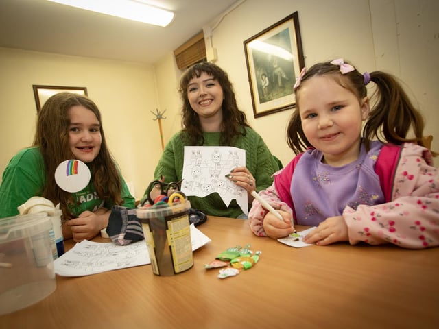 Arts and Crafts Facilitator Caitlyn Gallagher pictured with Lucy McLaughlin (8) and Bria Rooney (5) during Saturday's Feile's Springtime Shenanigans at Pilot's Row Centre. : .