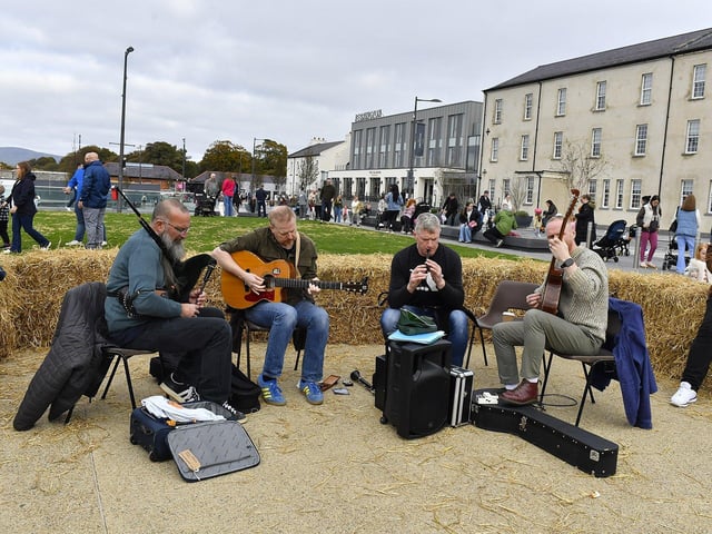 Folk musicians entertain visitors to the Festive Pumpkin Patch at Ebrington Square on Sunday afternoon. Photo: George Sweeney