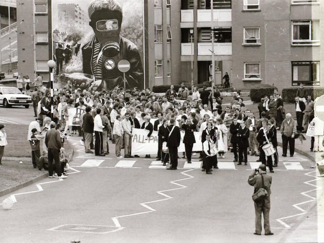 Sinn Féin's Martin McGuinness, Mary Nelis and other party members leading protests calling for all party peace talks.