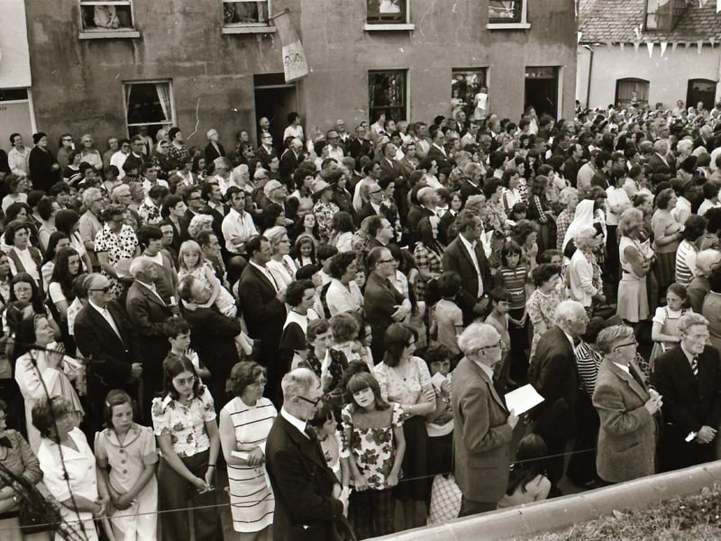 People gathered by the grotto in the Brandywell to celebrate St Columba's Day.