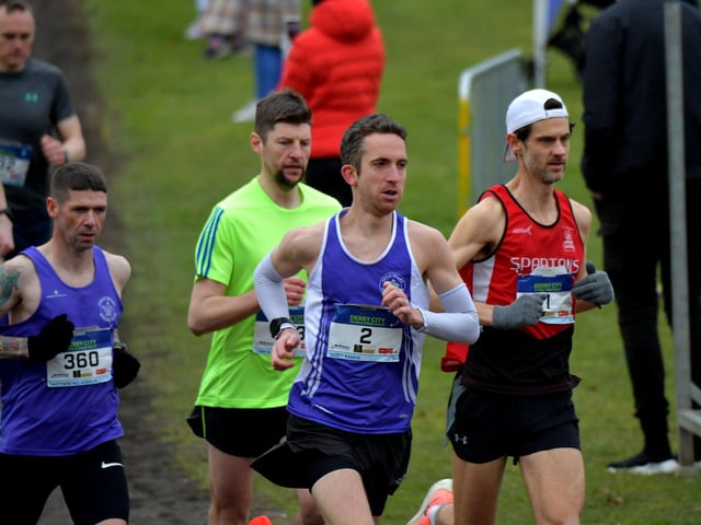 Matthew McLaughlin (360), Scott Rankin (2) and Alan Boggle (1) were early leaders in the Bentley Group Derry 10 Miler road race on Saturday morning. Photo: George Sweeney. DER2310GS – 090