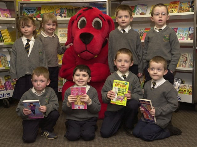 Schoolchildren with their books in Derry.