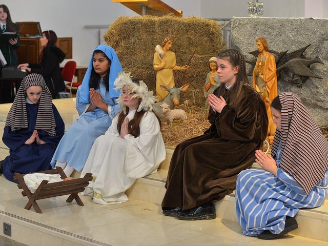 Students from St Cecilia’s College take part in a Nativity scene during a Carol Service held in St Mary’s Church, Creggan, on Tuesday afternoon. Photo: George Sweeney. DER2251GS – 08