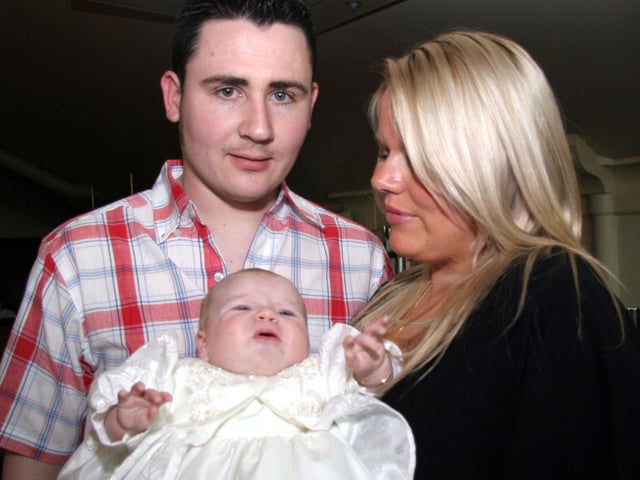 Godparents Leona King and Cathal Devine pictured with baby Shanice 0173JML : Parties and celebrations April 2006: Shanice Devine.