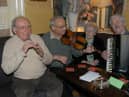 Risteard Mac Gabhann, on right, with Pádraig Ó Mianáin, Tony Mullan and Mary Ellen O'Doherty during Mary's 99th birthday celebrations in The Derby Bar in 2007.
