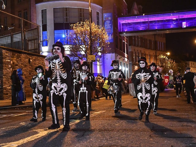 Derry’s ‘City of the Bones’ Halloween carnival parade makes its way along Strand Road on Friday evening. Photo: George Sweeney