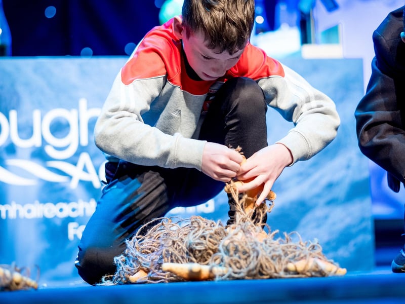 A student from Gaelcholáiste Dhoire participating in Starfish Sweep