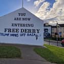 The message for US President Donald Trump painted on Free Derry Corner.