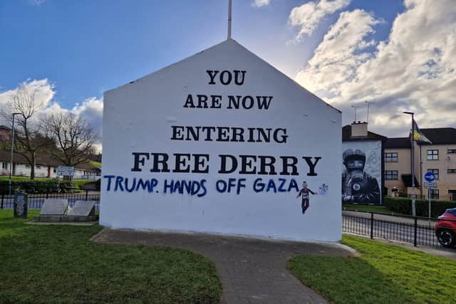 The message for US President Donald Trump painted on Free Derry Corner.