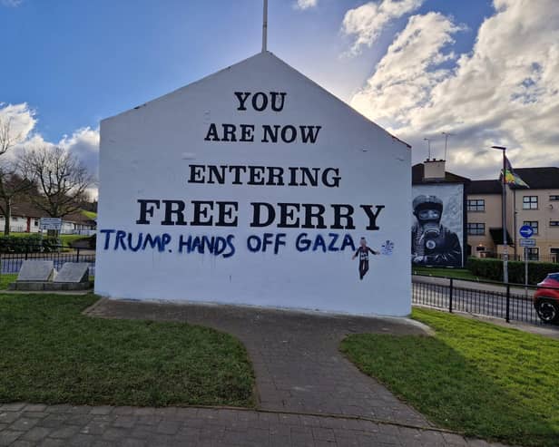 The message for US President Donald Trump painted on Free Derry Corner.