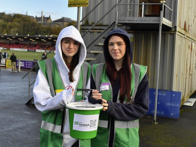 Volunteers from Foyle Network Foundation collecting donations for the Foyle Foodbank, at Brandywell Stadium, prior to Derry City’s game Shamrock Rovers. Photograph: George Sweeney