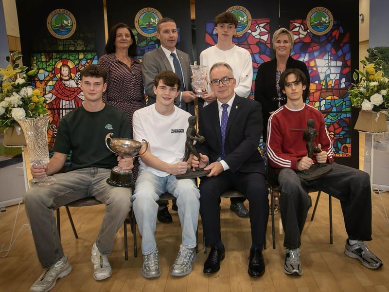 Derry City F.C. Prize for Soccer / Brendan Dolan Award for Gaelic Football and the Tom Dunbar Award for Commitment award winners - Front from left, Matthew James, Oran Donnelly and Cathal McNicholl pictured with Mr. Tony McGonigle, Senior Teacher. At back from left are Mrs Sinéad McGonigle (Teacher Governor), Mr Ryan Horner (Senior Teacher), Callum Downey, and Ms Karen Simpson (Parent Governor).
: .