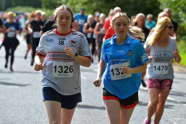 Gemma Devine (1326) and Ellare Devine (1325) taking part in the Eglinton Runners charity 5K race at Campsie on Sunday morning. Photo: George Sweeney. DER2331GS - 16