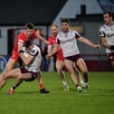 Derry’s Anton Tohill contests possession with Galway’s Matthew Tierney back in February. Photo: George Sweeney
