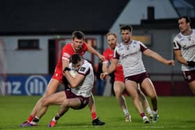 Derry’s Anton Tohill contests possession with Galway’s Matthew Tierney back in February. Photo: George Sweeney