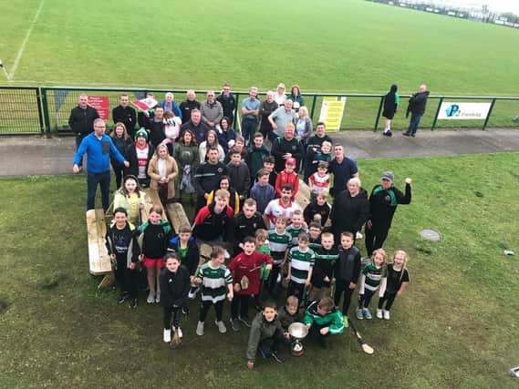 Na Magha members welcome the Richie McElligott Cup to Pairc Na Magha after Derry Under 20's All Ireland 'B' success in Croke Park last week.