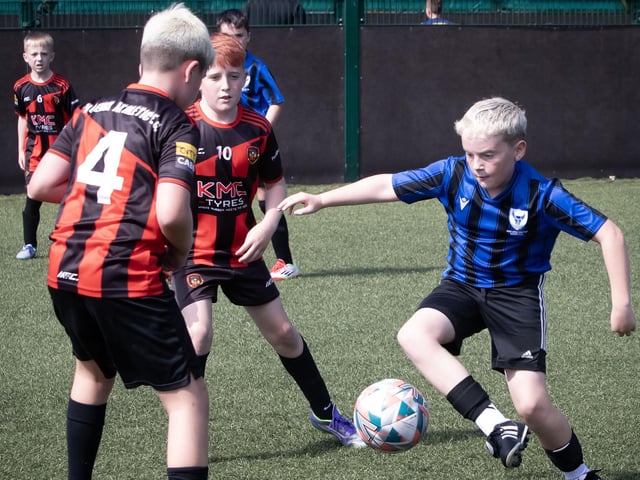 Action from the recent semi-final clash between Phoenix Athletic and Oxford United at Bay Road in the Padraig Barton Memorial Cup. (Photos: Jim McCafferty Photography)