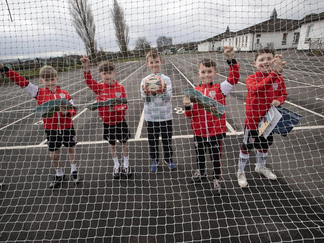 FOOTBALL AND BOOKS!. . . . .P5 pupils and Derry City fans Darragh Duddy, Oscar Duffy, Jadyn Armstrong, Killian McGonagle and Finn Hanley-Mullan celebrating World Book Day at Hollybush. (Photos: Jim McCafferty Photography)
