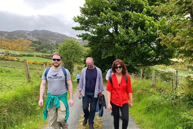 From left to right, Aidan Cosgrove, Paul O'Keeffe and Emer Cosgrove taking part in the walk.