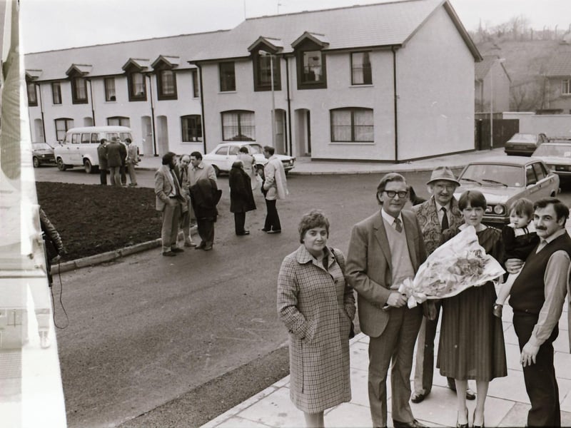 Residents and the new homes at Deanery Street.