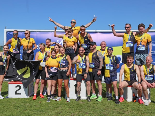 Celebration time for this team after a tough 13.1 mile course.