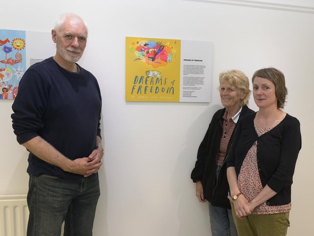 Kevin Abbott (left) from the Foyle Amnesty International launched the “Dreams of Freedom” exhibition at the Eden Arts Centre on Friday evening to mark both Culture Night and World Peace Day. Included in the picture are Diana King (Foyle Amnesty International) and Judi Logue (Eden Arts Centre Co-ordinator). DER3715GS136
