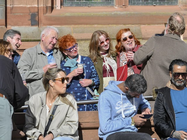 Revellers enjoy the sunshine and the music in Guildhall Square during the Jazz Festival.  Photo: George Sweeney