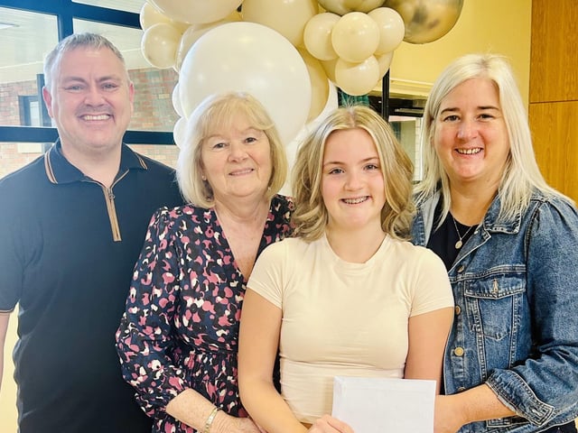 Clodagh Mc Fadden is delighted to share her wonderful GCSE outcomes with her parents and grandmother.