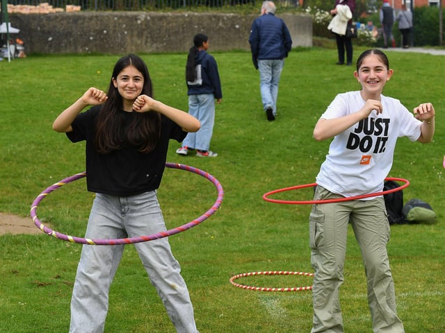 Hula hoop experts at the North West Migrant Forum’s Fun Day held in Brooke Park on Sunday. Photo: George Sweeney