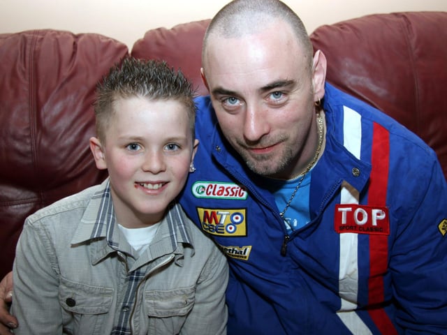 Birthday boy Michael smiles for the camera with his Godfather Sean 0051JML : Parties and nights out in Derry and Donegal in February 2006.