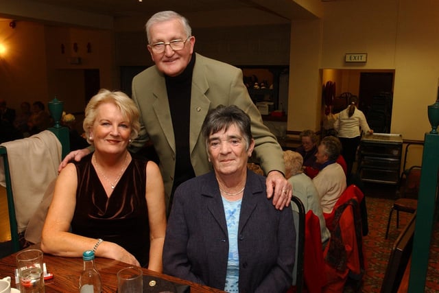 Mary McCauley, Michael McCarron, and Eileen Hepburn. (0912PG39)                               :Christmas parties for Derry's senior citizens in December 2003