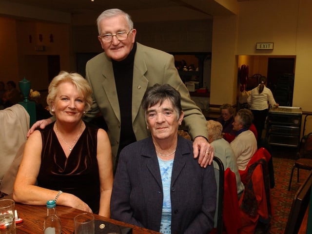 Mary McCauley, Michael McCarron, and Eileen Hepburn. (0912PG39) :Christmas parties for Derry's senior citizens in December 2003