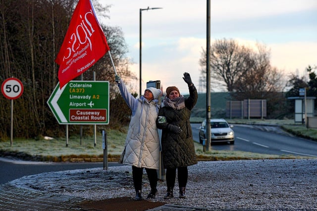 Striking health and social care workers picket outside Gransha on Monday morning. Photo: George Sweeney. DER2250GS – 13