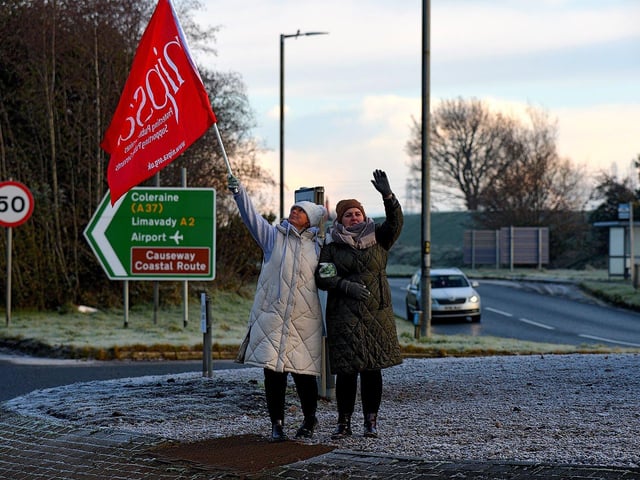 Striking health and social care workers picket outside Gransha on Monday morning. Photo: George Sweeney. DER2250GS – 13