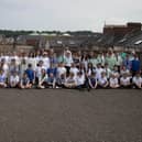 Schoolchildren from Long Tower, Nazareth House and Fountain Primary Schools who took part in the Celebrating Commonality project with the Churches Trust, pictured on the City’s Walls on Monday last. (Photos: Jim McCafferty Photography)