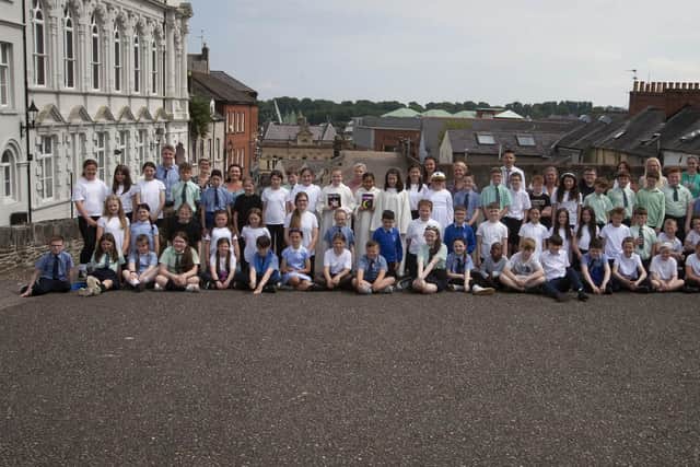 Schoolchildren from Long Tower, Nazareth House and Fountain Primary Schools who took part in the Celebrating Commonality project with the Churches Trust, pictured on the City’s Walls on Monday last. (Photos: Jim McCafferty Photography)