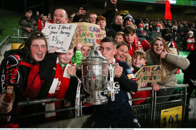 Darragh Burns of St Patrick's Athletic celebrates with fans after his side's victory in the Extra.ie FAI Cup Final match between Bohemians and St Patrick's Athletic at Aviva Stadium in Dublin in 2021. Photo by Michael P Ryan/Sportsfile