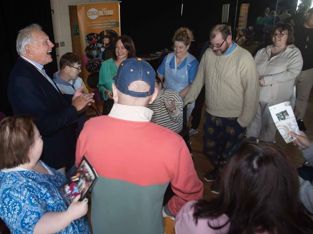 Lord Lieutenant Ian Crowe meeting Stage Beyond Theatre Company members in the Studio at the Millennium Forum.