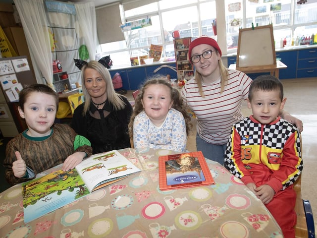 Celebrating World Book Day are Miss Barr, Miss Barnfield with pupils Michael, Aoise and Caden at Greenhaw PS last week.