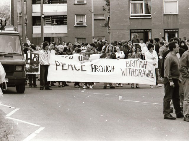 Sinn Féin's Martin McGuinness, Mary Nelis and other party members leading protests calling for all party peace talks.
