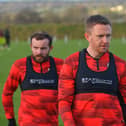 Derry City full back Shane Ferguson with Paul McMullan in training.  Photograph: George Sweeney