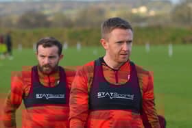 Derry City full back Shane Ferguson with Paul McMullan in training.  Photograph: George Sweeney