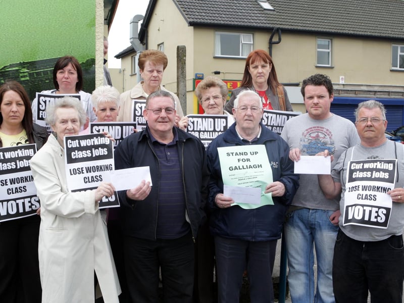 Galliagh residents and service users handing over petition letters to Councillor Tony Hassan calling for support in their campaign to stop the DSD cutting vital services to the area. (2705C44)